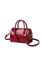 CILYON Sac Croc Mini Duffle in rouge croc leather — side view with strap extended